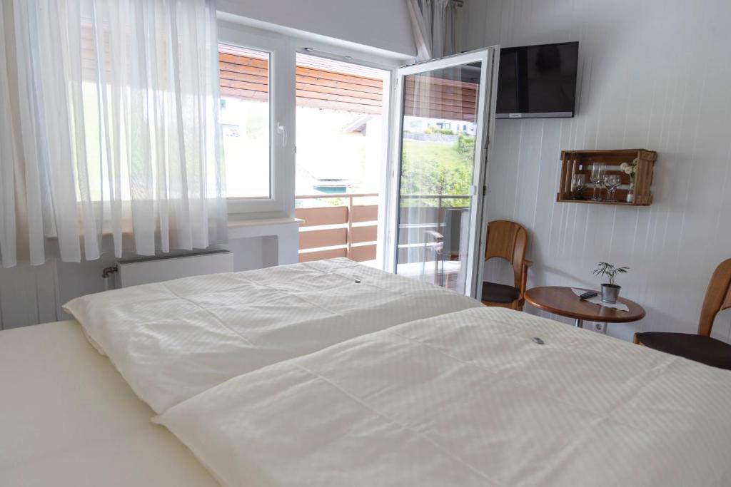 Postel nebo postele na pokoji v ubytování Weinhaus Henerichs