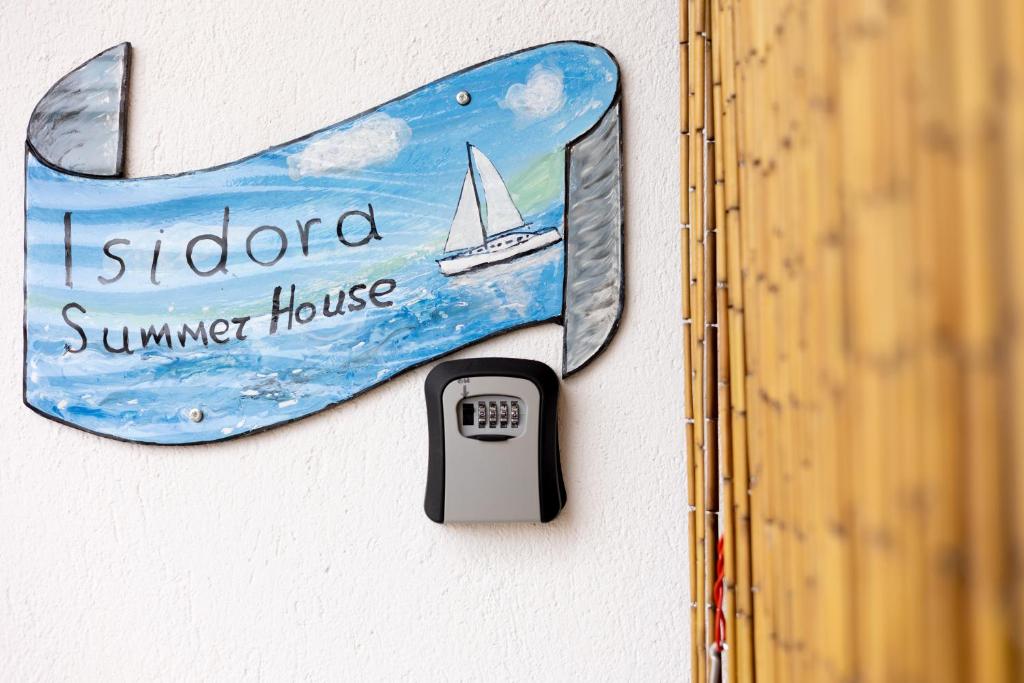 Certifikát, hodnocení, plakát nebo jiný dokument vystavený v ubytování Isidora Summer House