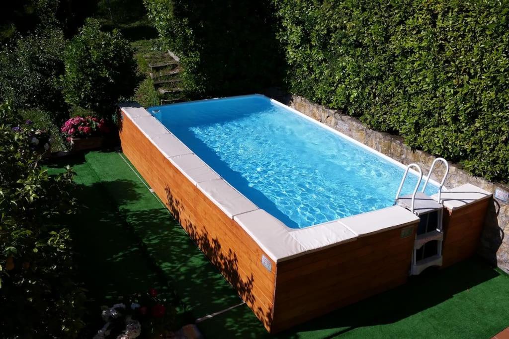 Bazén v ubytování Conca di Sopra Home nebo v jeho okolí
