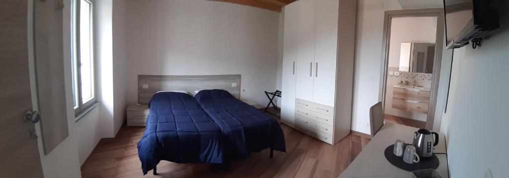 TV a/nebo společenská místnost v ubytování Il Glicine B&b