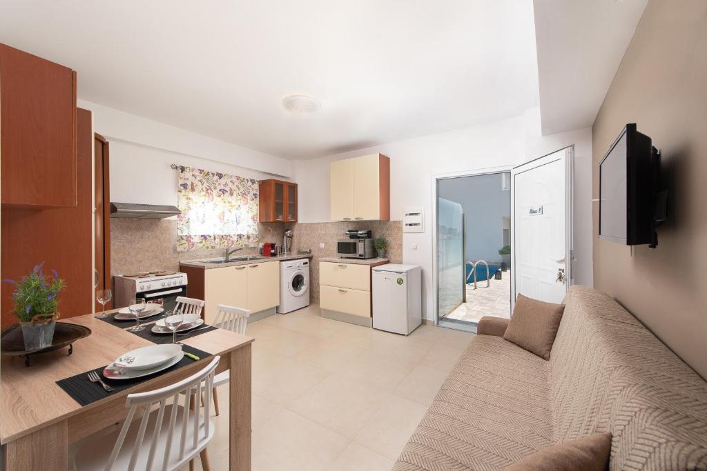Kuchyň nebo kuchyňský kout v ubytování Iliana Apartment