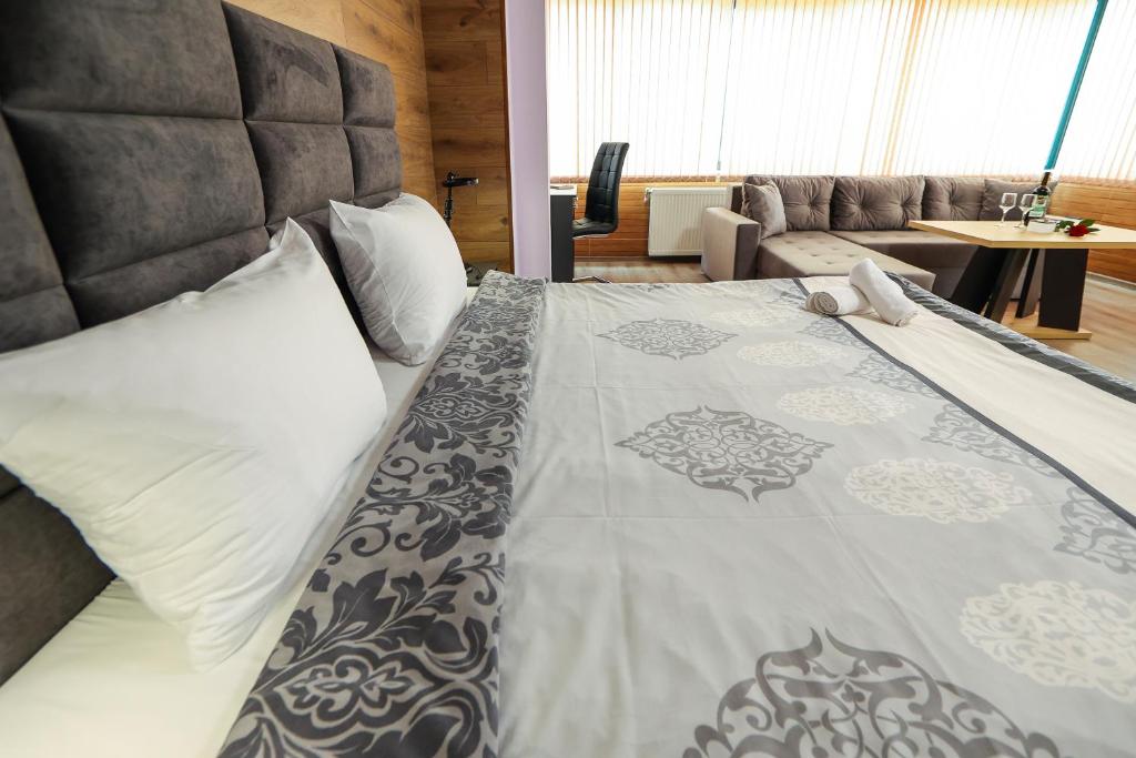 Postel nebo postele na pokoji v ubytování Family Hotel Gotse Delchev