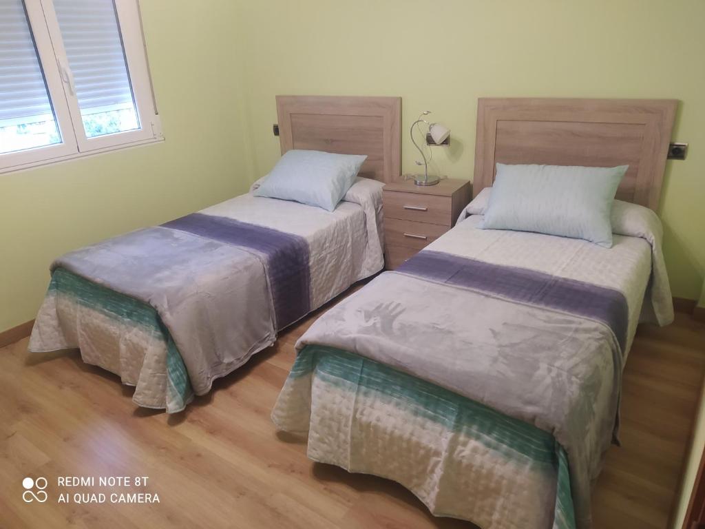 Posteľ alebo postele v izbe v ubytovaní casa Renda
