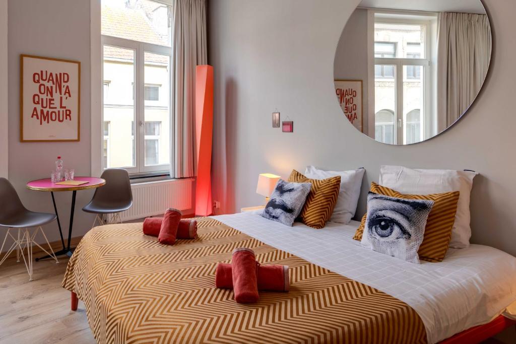 Postel nebo postele na pokoji v ubytování B&B Belle de Nuit