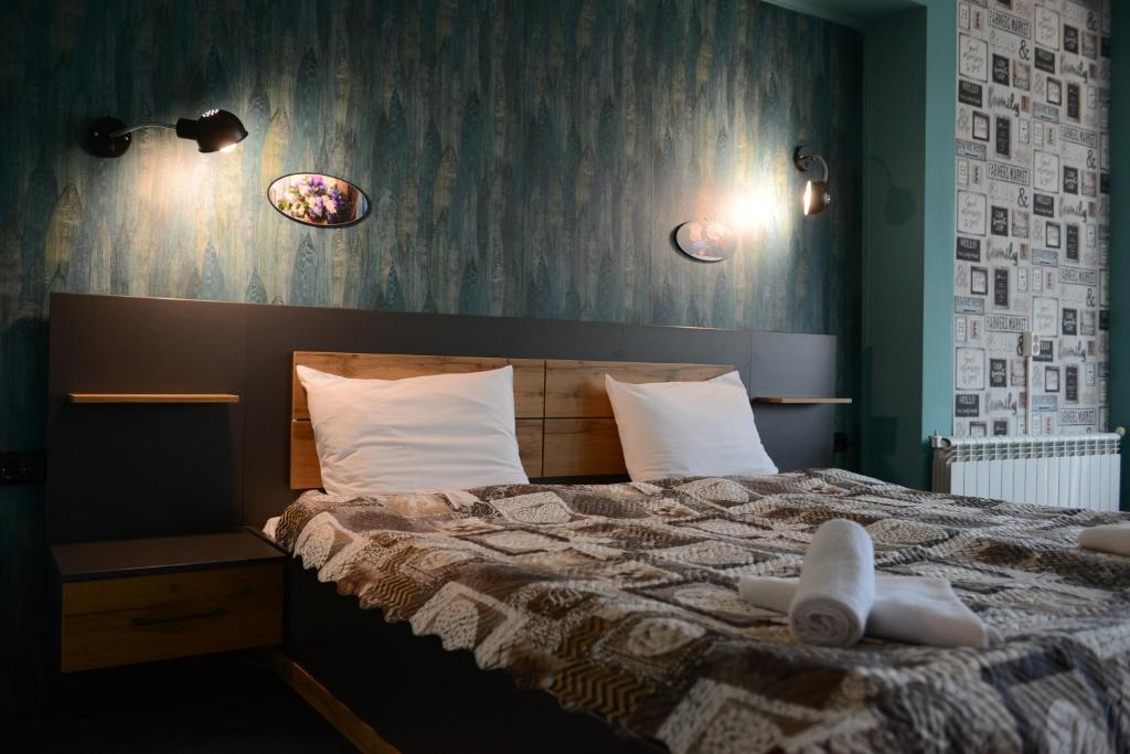 Postel nebo postele na pokoji v ubytování Family Hotel Gotse Delchev