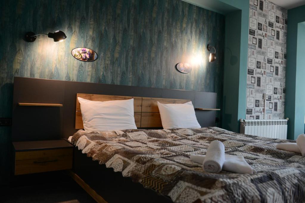 Postel nebo postele na pokoji v ubytování Family Hotel Gotse Delchev