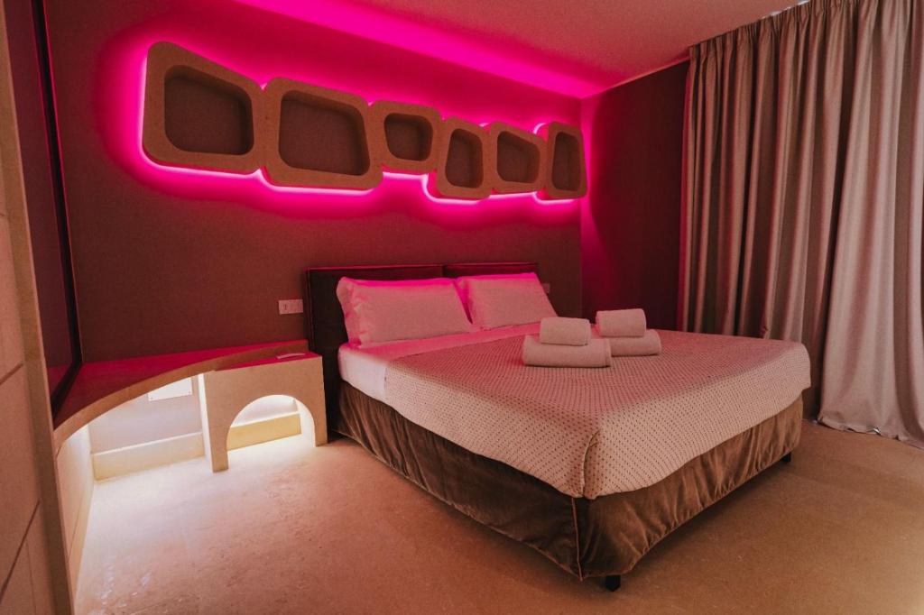 Postel nebo postele na pokoji v ubytování Euphoria Resort