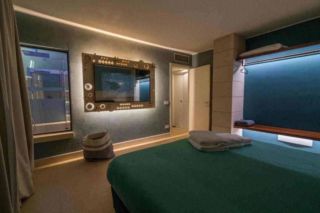Postel nebo postele na pokoji v ubytování Euphoria Resort