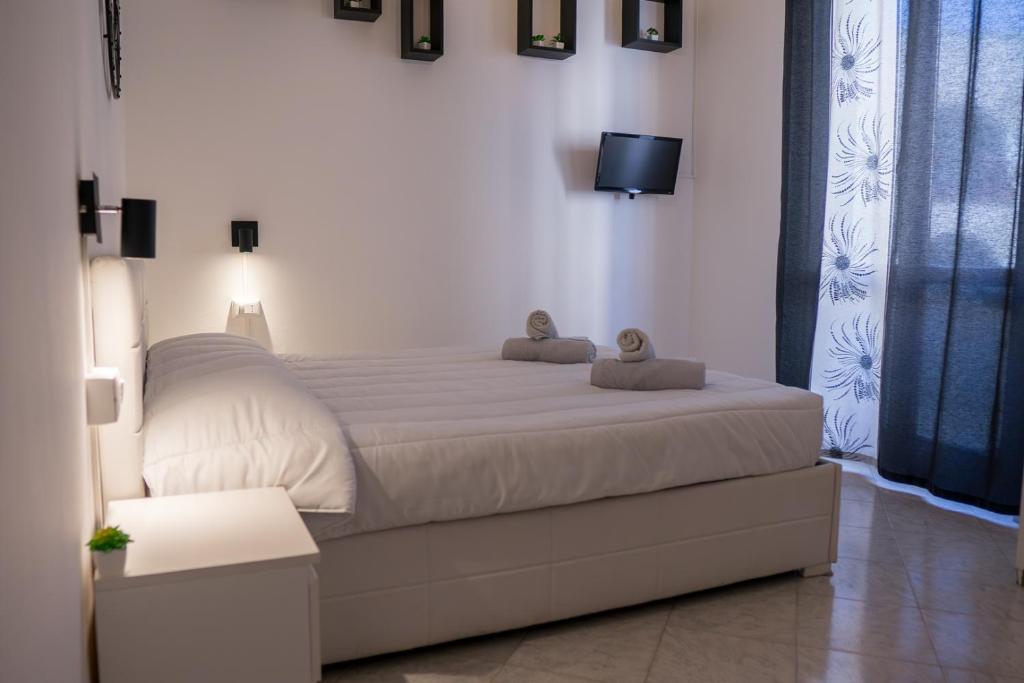 Postel nebo postele na pokoji v ubytování Doan rooms