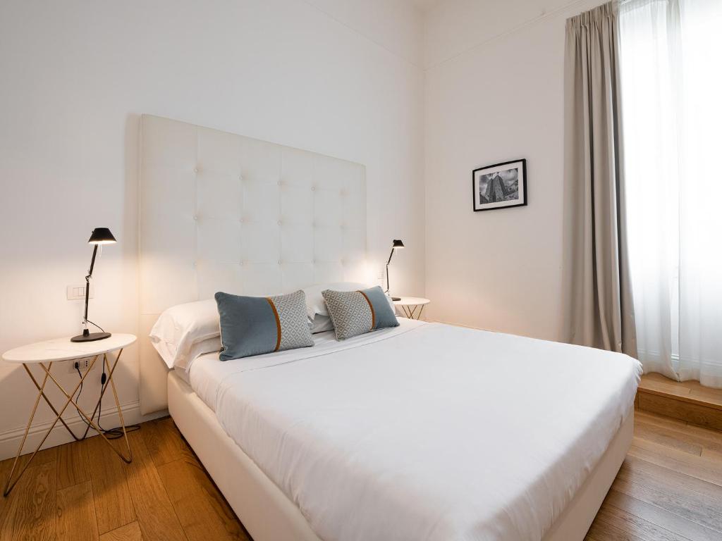 Posteľ alebo postele v izbe v ubytovaní PLEY Boutique Del Centro