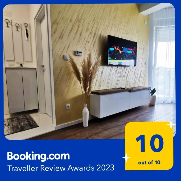 TV a/nebo společenská místnost v ubytování VIP Apartment