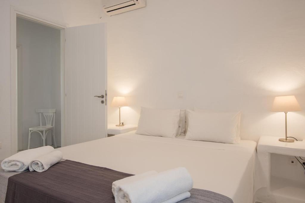 Postel nebo postele na pokoji v ubytování Aeraki Villas