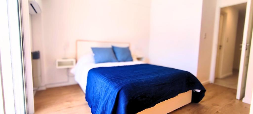 Ein Bett oder Betten in einem Zimmer der Unterkunft Excelente Semipiso Plaza Paso by Lofter