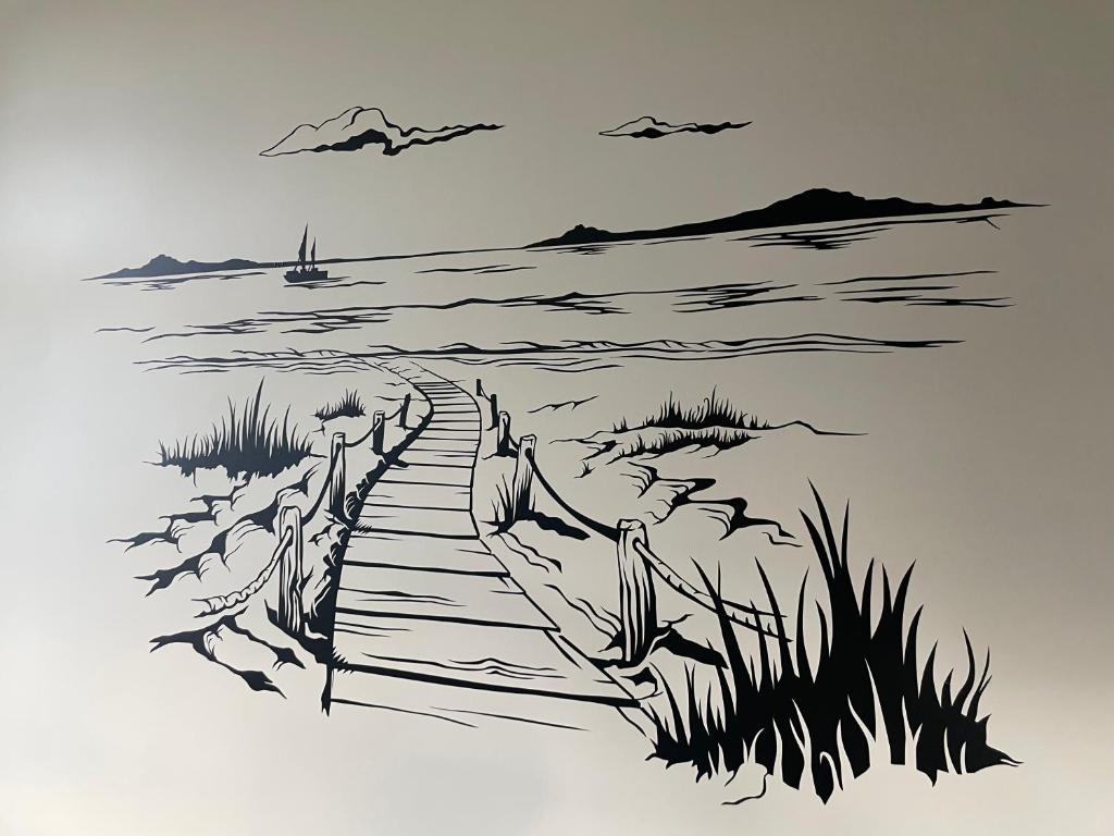 un dibujo de un camino de madera hacia la playa en Luxus Lindenhof Apartments, en Zetel