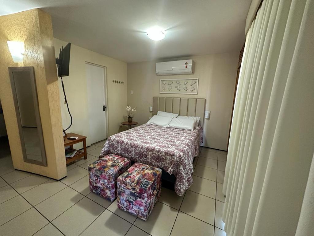 Postel nebo postele na pokoji v ubytování Apartamento Em Andar Alto com Vista Mar Meireles