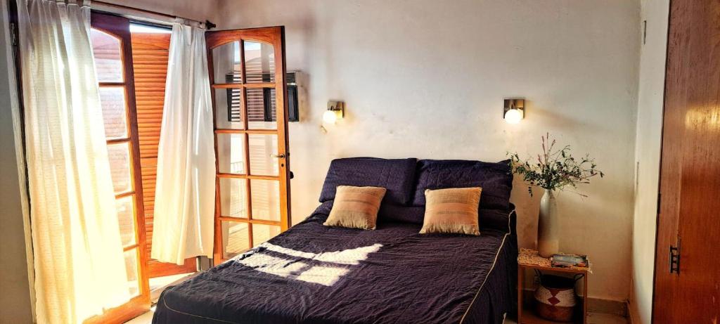 Postel nebo postele na pokoji v ubytování Alquiler Temporario Zona Céntrica En Córdoba