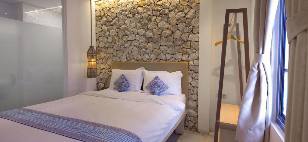 Postel nebo postele na pokoji v ubytování Little Mykonos