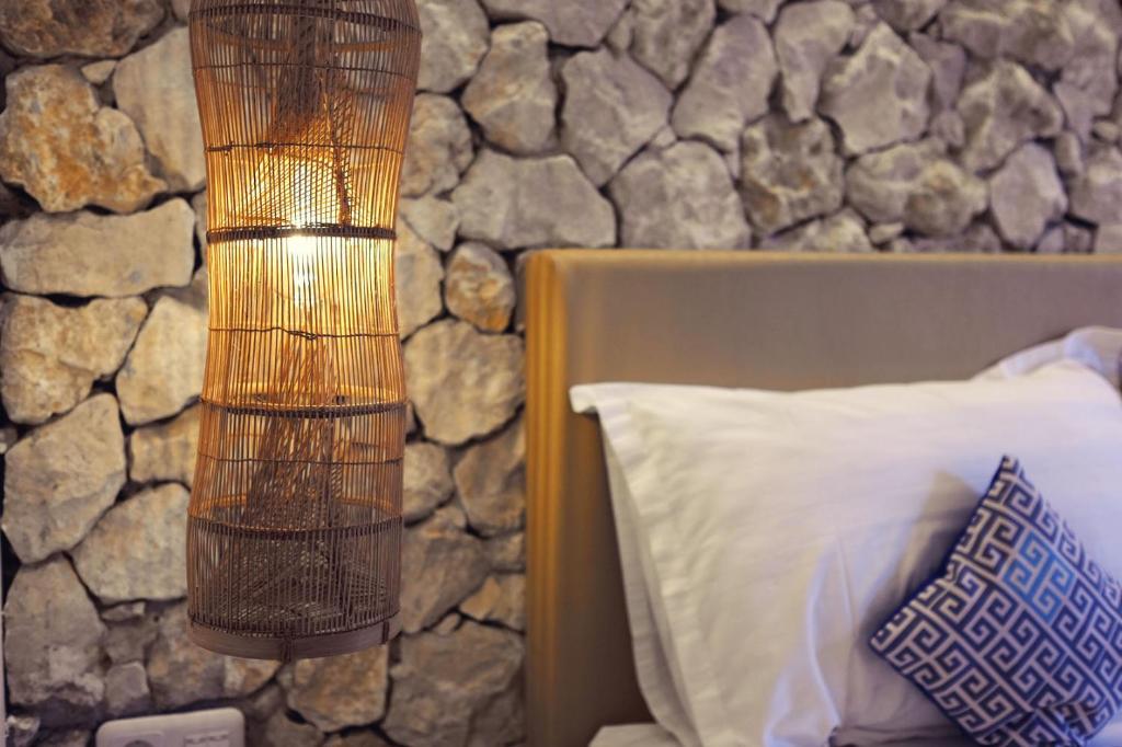 Postel nebo postele na pokoji v ubytování Little Mykonos