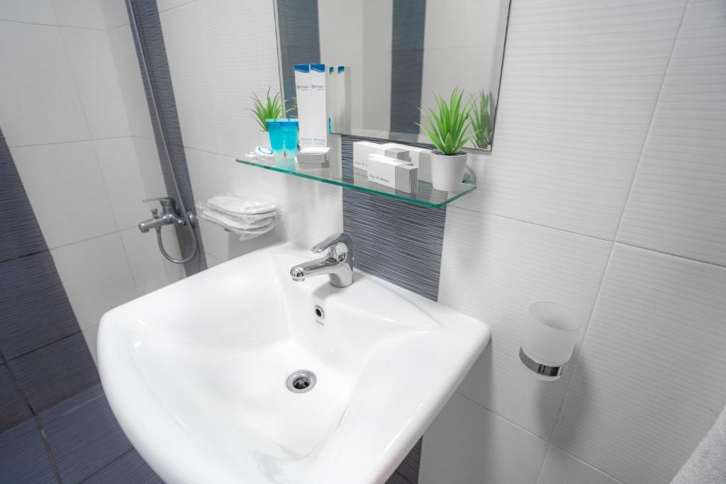Koupelna v ubytování العاصمة للشقق الفندقية - Capital Hotel Apartments