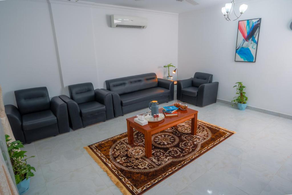 Posezení v ubytování العاصمة للشقق الفندقية - Capital Hotel Apartments