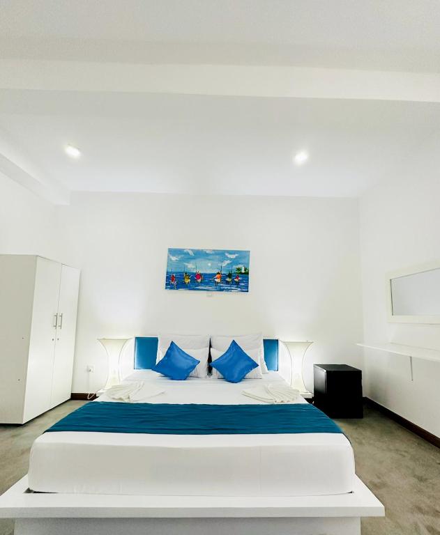 Katil atau katil-katil dalam bilik di Sunset Sands