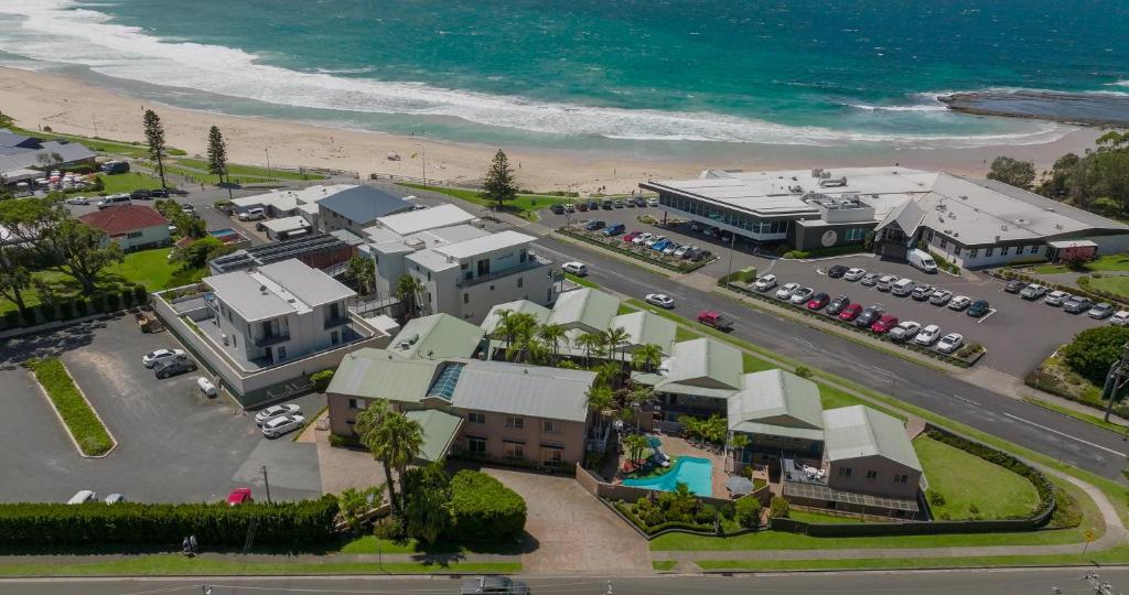 an aerial view of a resort next to the ocean at Mollymook Shores in Mollymook