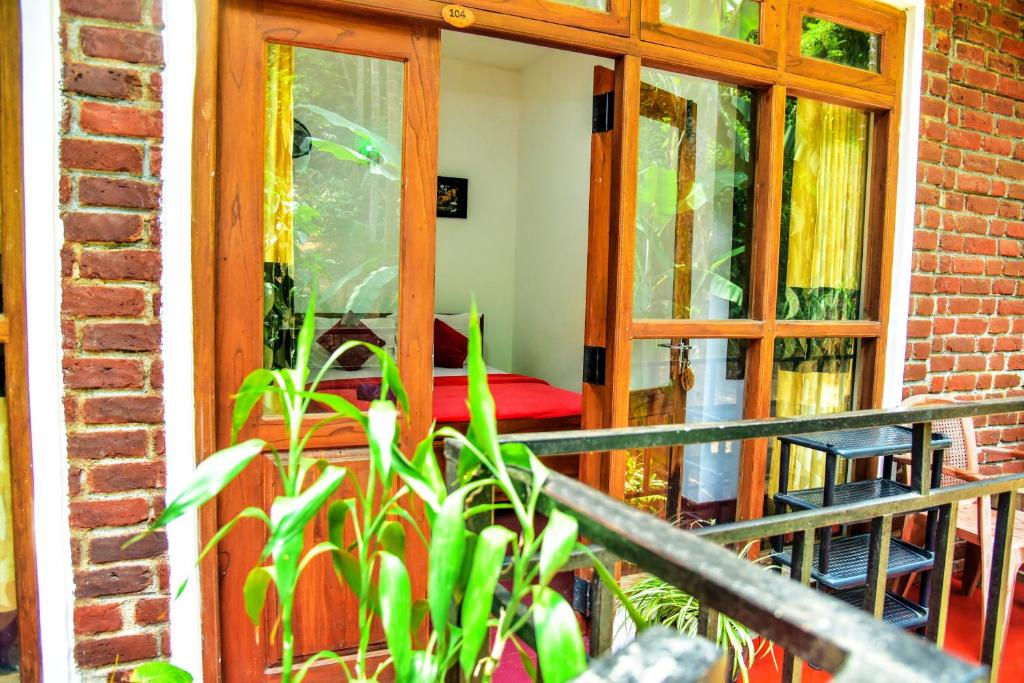 Balkón nebo terasa v ubytování MUM Jungle Inn