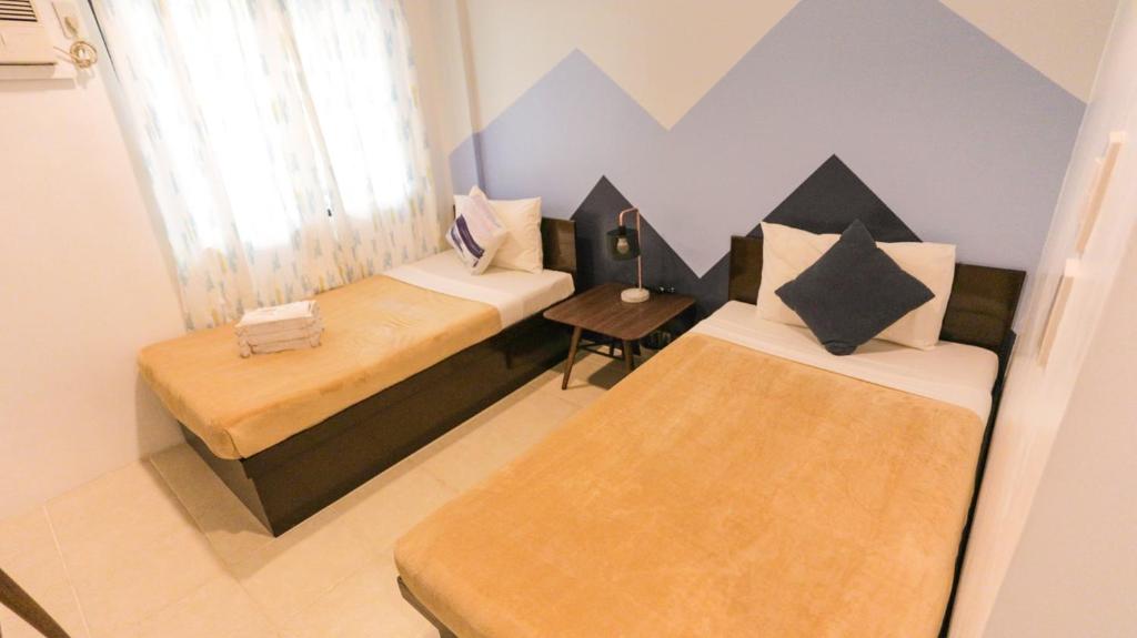 Postel nebo postele na pokoji v ubytování Coron Ecolodge