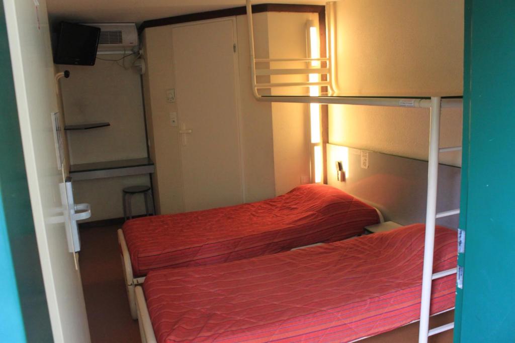 Postel nebo postele na pokoji v ubytování Hôtel Premiere Classe Pamiers