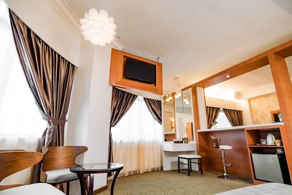 Kuchyň nebo kuchyňský kout v ubytování MITC Hotel
