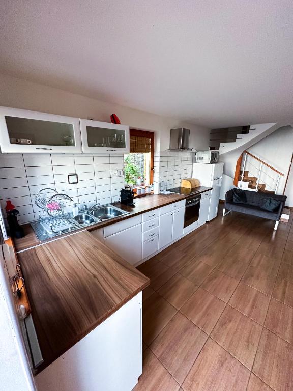 Kuchyň nebo kuchyňský kout v ubytování Panoráma Csopak