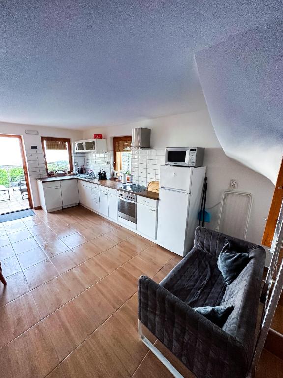Kuchyň nebo kuchyňský kout v ubytování Panoráma Csopak