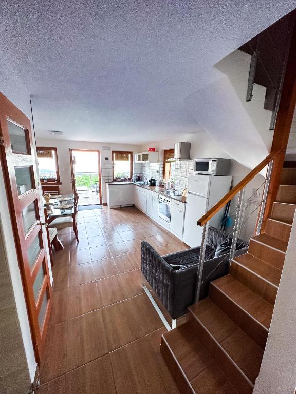 Kuchyň nebo kuchyňský kout v ubytování Panoráma Csopak