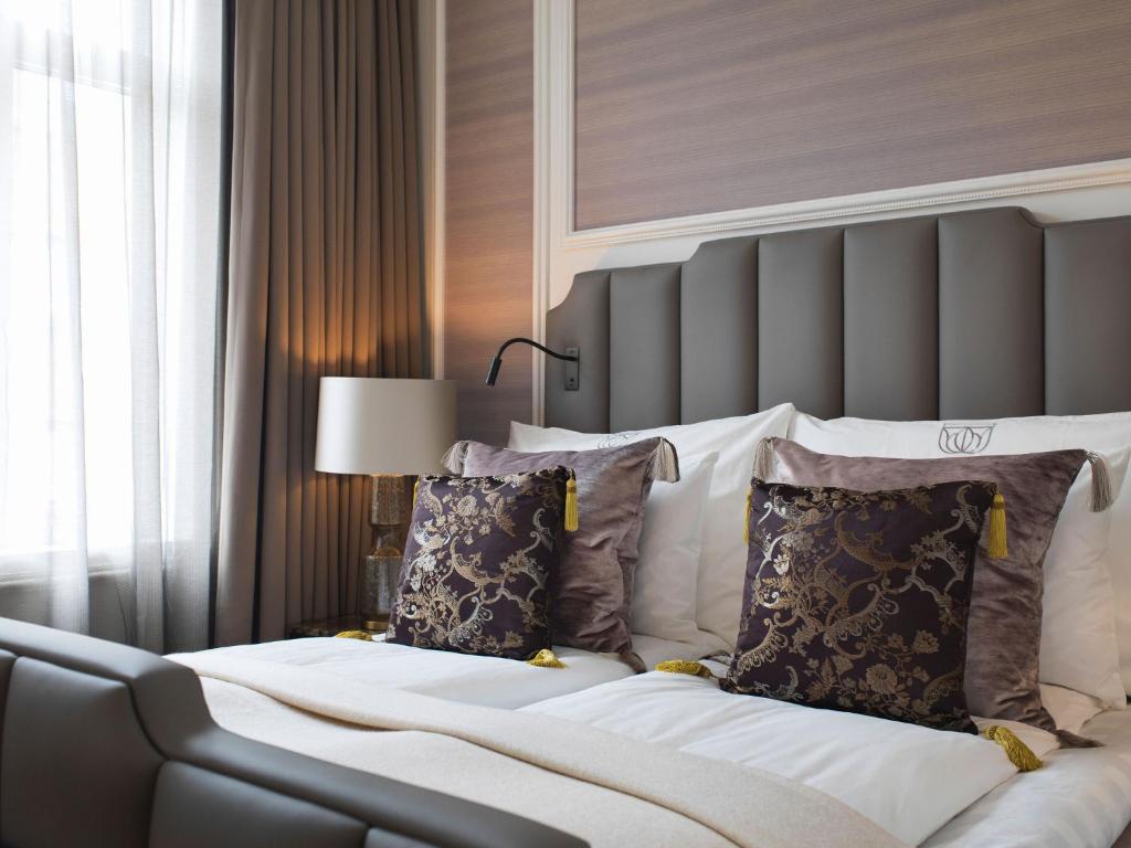 Postel nebo postele na pokoji v ubytování Britannia Hotel