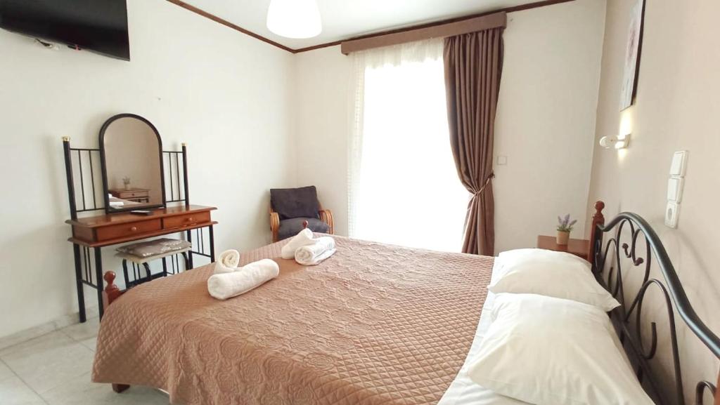 Postel nebo postele na pokoji v ubytování Venus Apartments