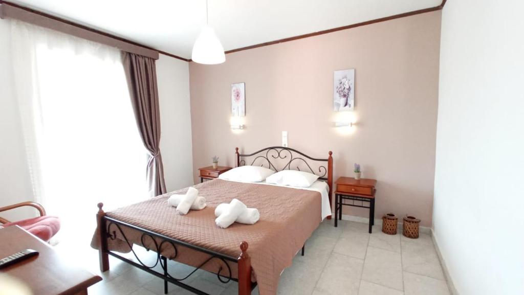 Postel nebo postele na pokoji v ubytování Venus Apartments
