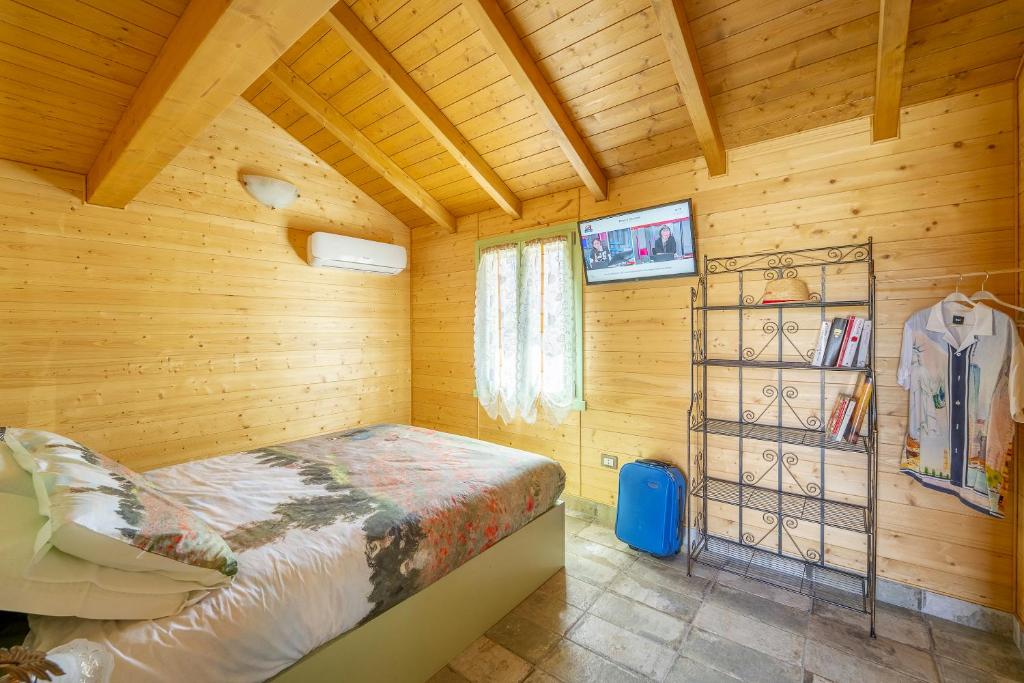 Postel nebo postele na pokoji v ubytování Il Campo di Nonno Giò