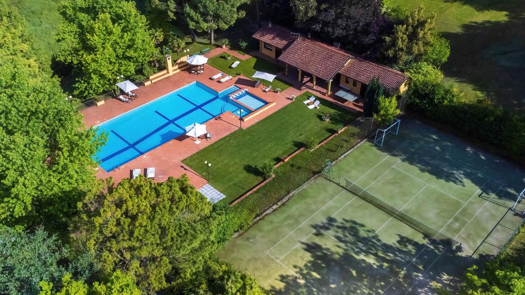 an overhead view of a house with a swimming pool at Tenuta Contessa Chiara 17, Emma Villas in Fontanile