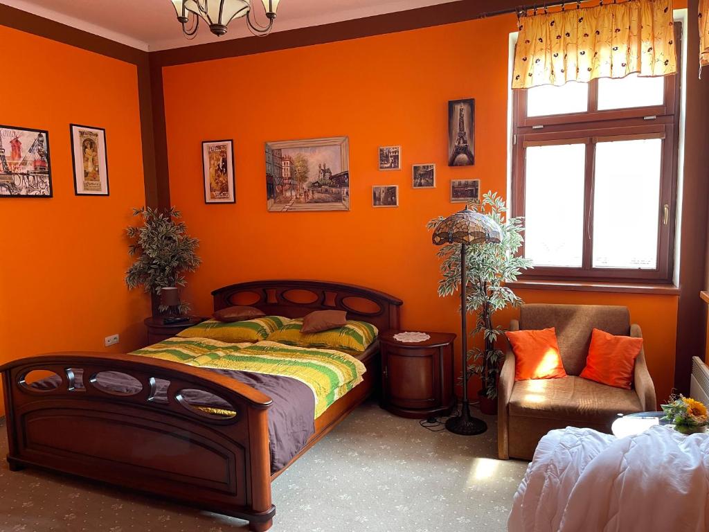 A bed or beds in a room at Apartmány Laverna