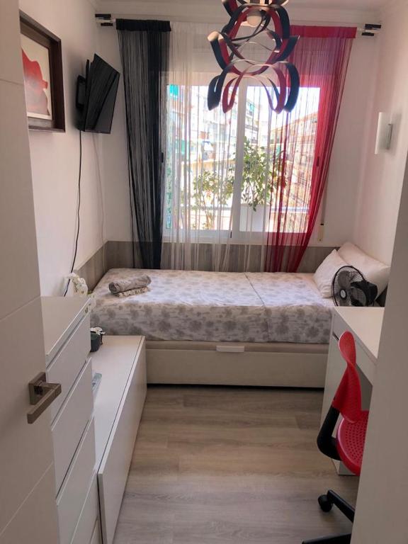 Postel nebo postele na pokoji v ubytování Gran partamiento en Alicante