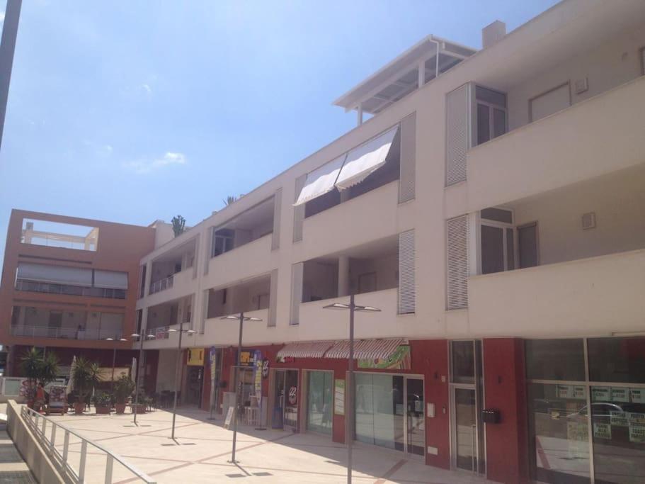 a large white building with a lot of windows at Coral Bay Suite Gallipoli in Gallipoli
