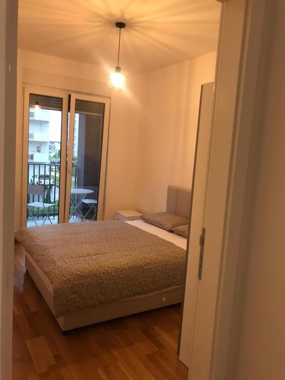 Letto o letti in una camera di LAGATOR LUX