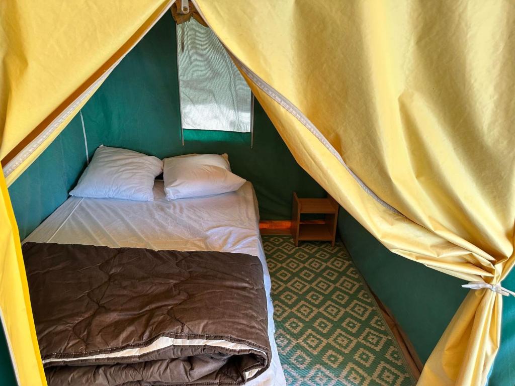 Postel nebo postele na pokoji v ubytování LES EYCHECADOUS