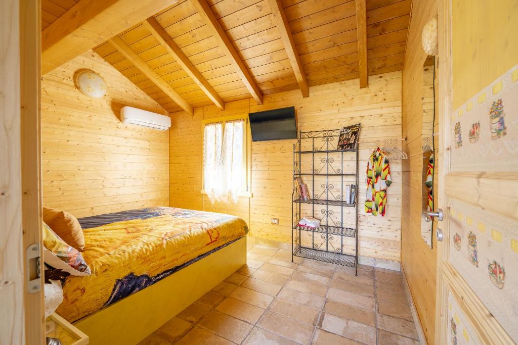 Postel nebo postele na pokoji v ubytování Il Campo di Nonno Giò