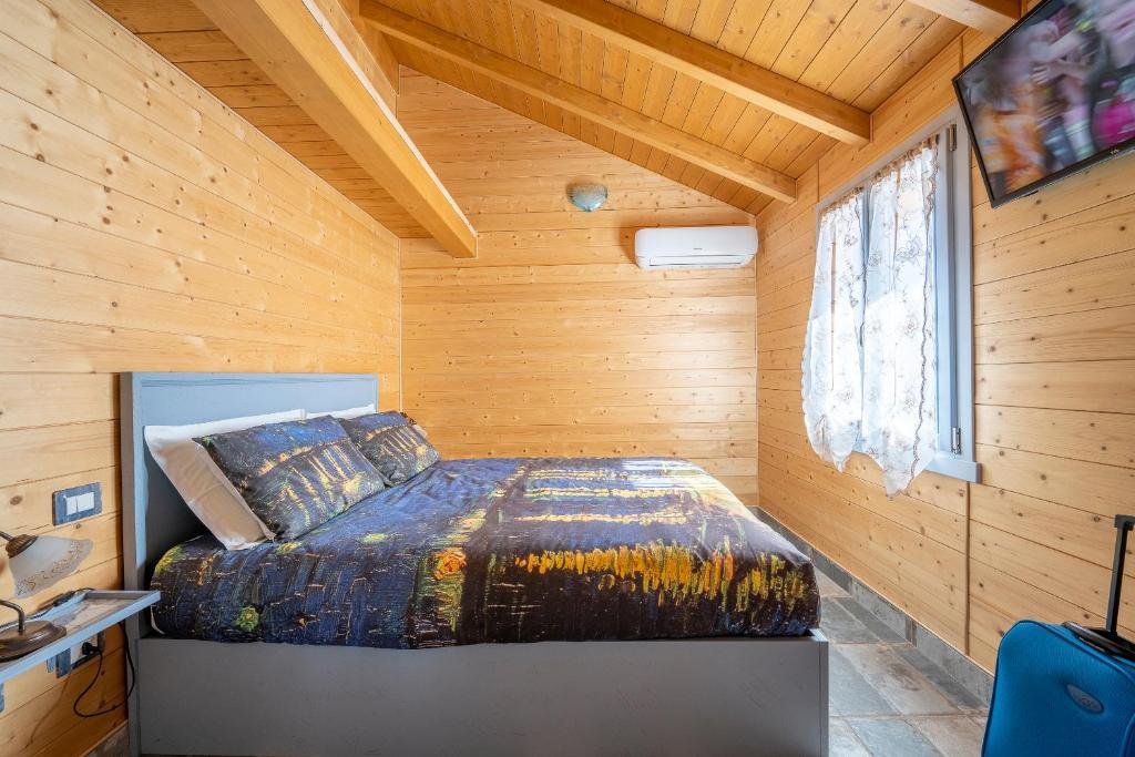 Postel nebo postele na pokoji v ubytování Il Campo di Nonno Giò