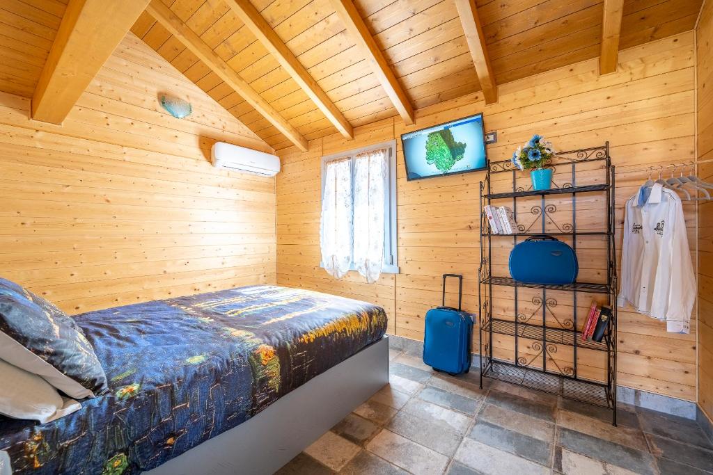 Postel nebo postele na pokoji v ubytování Il Campo di Nonno Giò