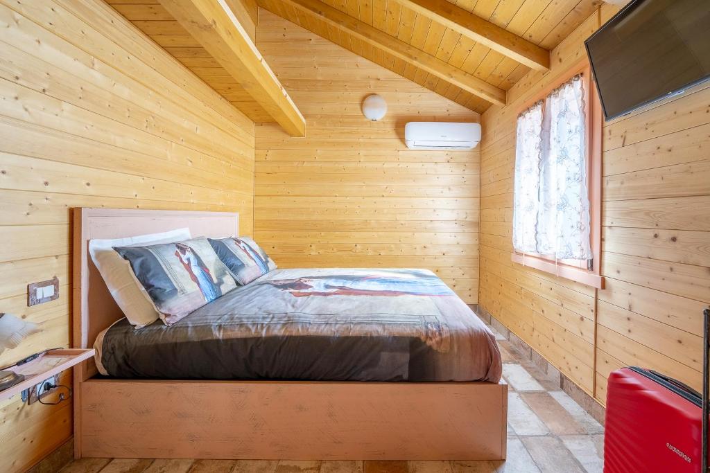 Postel nebo postele na pokoji v ubytování Il Campo di Nonno Giò