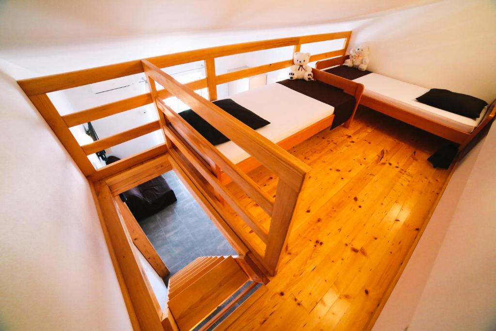 Postel nebo postele na pokoji v ubytování Villa Brigita