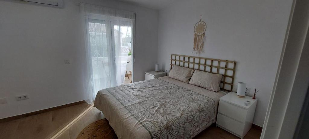 Katil atau katil-katil dalam bilik di Casa adosada Gran Avenida con billar
