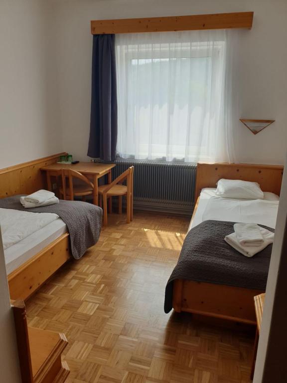 Postel nebo postele na pokoji v ubytování Neuhof